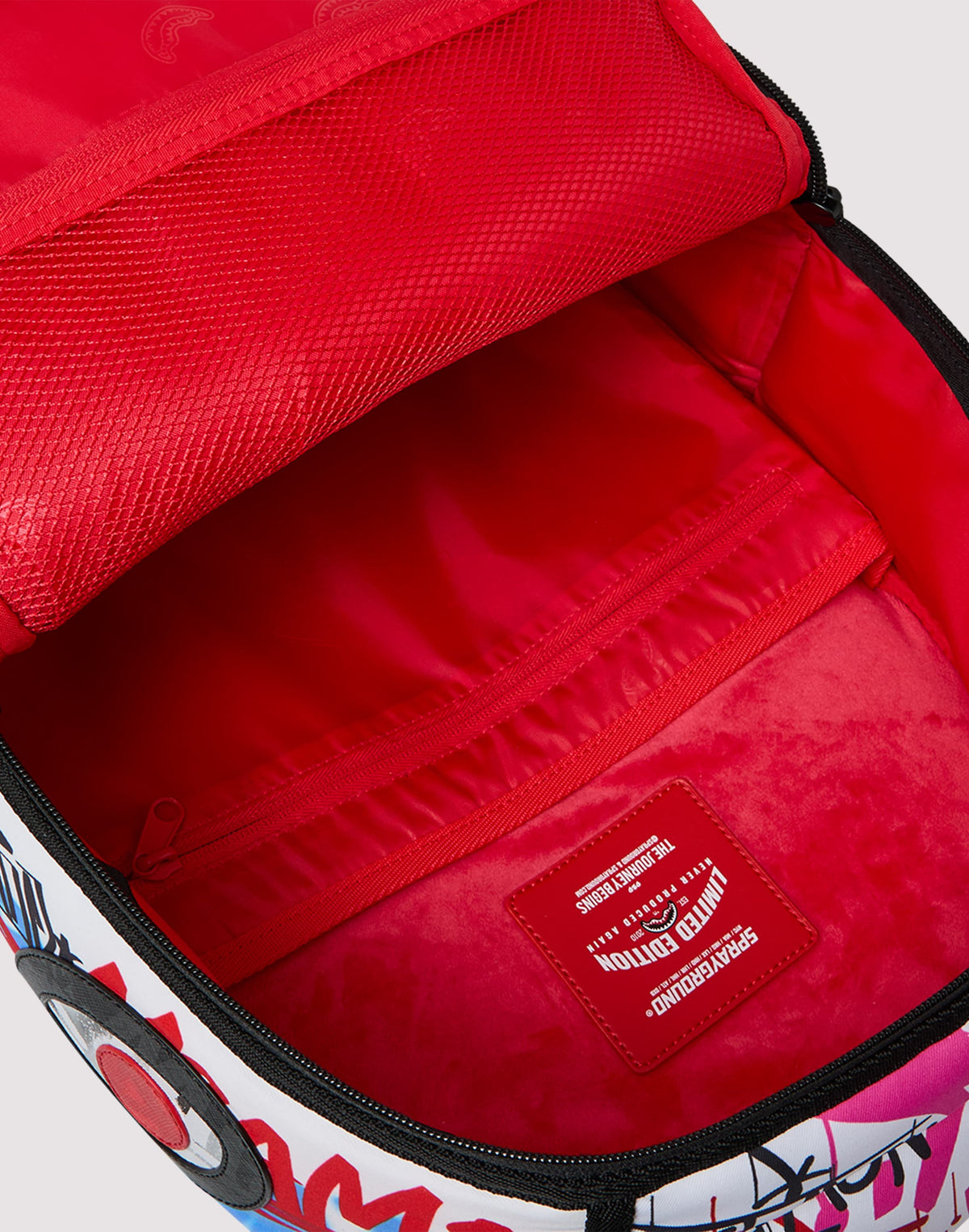 SPRAYGROUND TAGGED PUFFER BACKPACK