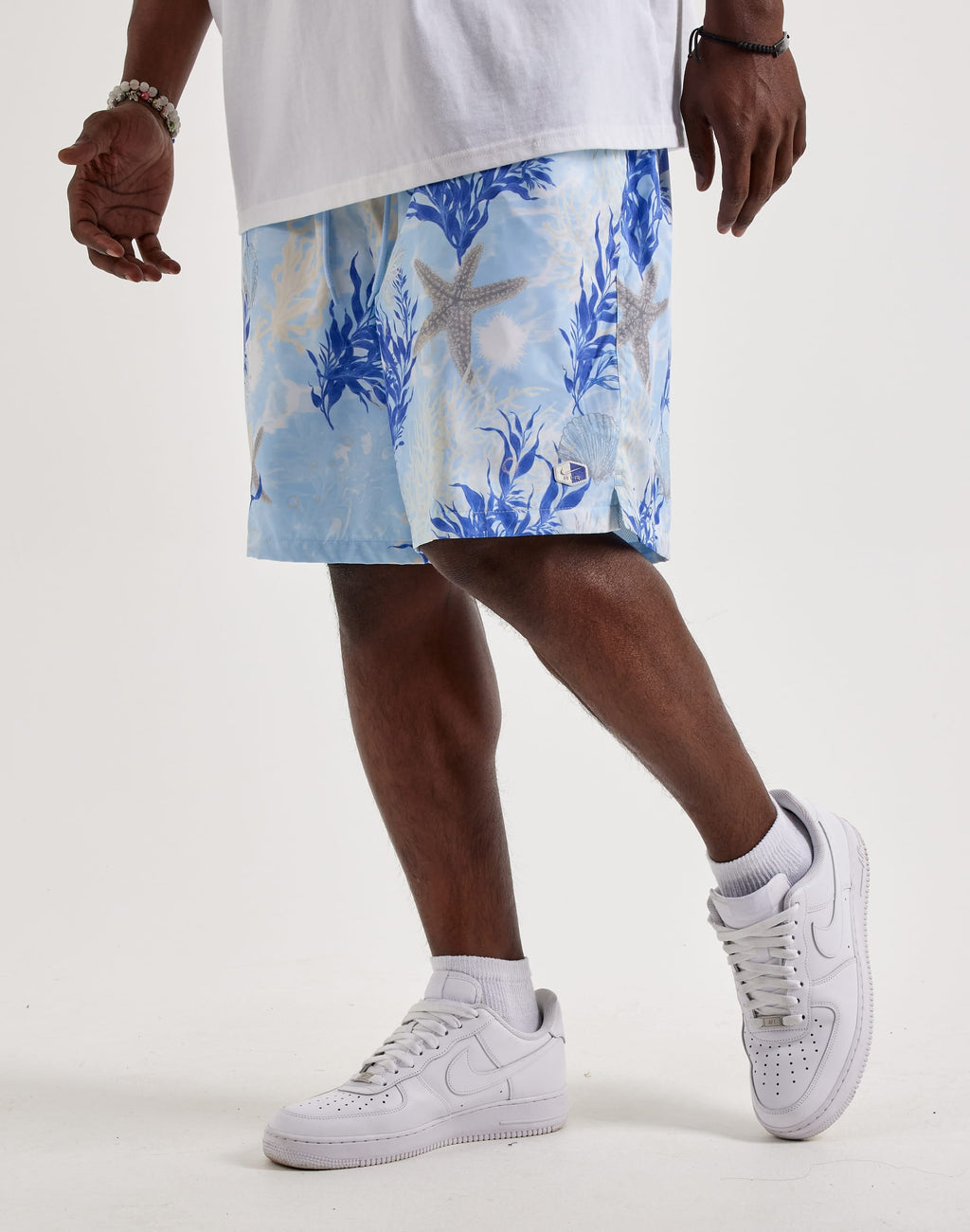 NIKE CLUB WOVEN FLOW SHORTS BLUE